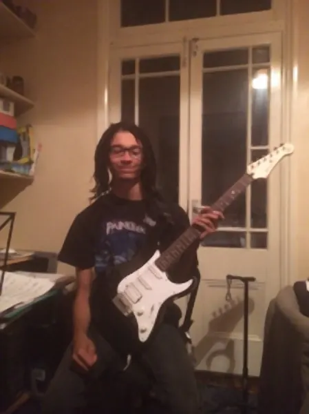 Guitar pupil Alex Gunn and their electric guitar, taught by Malcolm Callus in London SE16