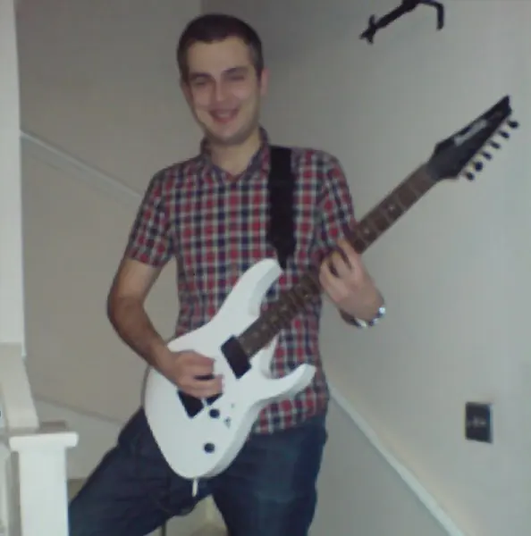 Andy Langthorne, an electric guitar student of guitar teacher Malcolm Callus in Rotherhithe, London