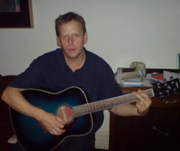 Cool Gool Music student Dave Gasson pictured with their electric and acoustic guitar, south east London