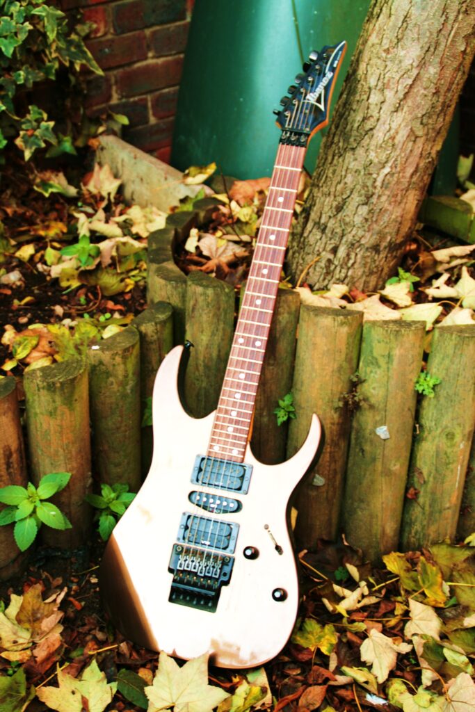 Electric guitar close-up under warm studio light