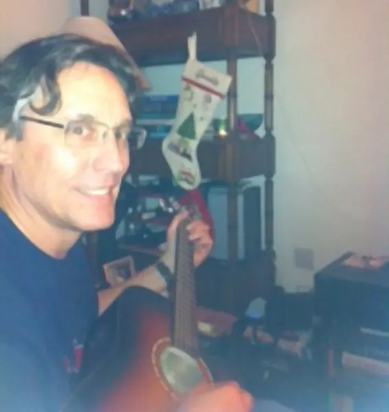 George Stein, an acoustic guitar student of guitar teacher Malcolm Callus in Rotherhithe, London