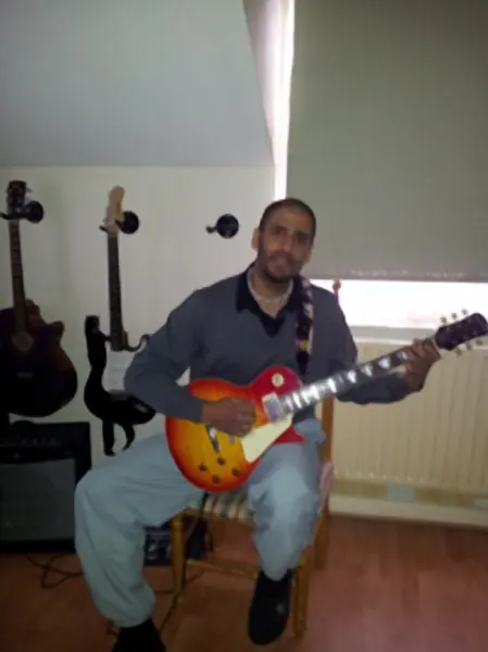 Kemal “Spider” Suleyman and the electric guitar they learn on, Cool Gool Music guitar lessons in Rotherhithe