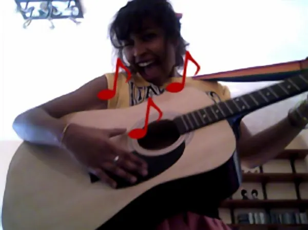 Kym Marquis-Lee, an acoustic guitar student of guitar teacher Malcolm Callus in Rotherhithe, London