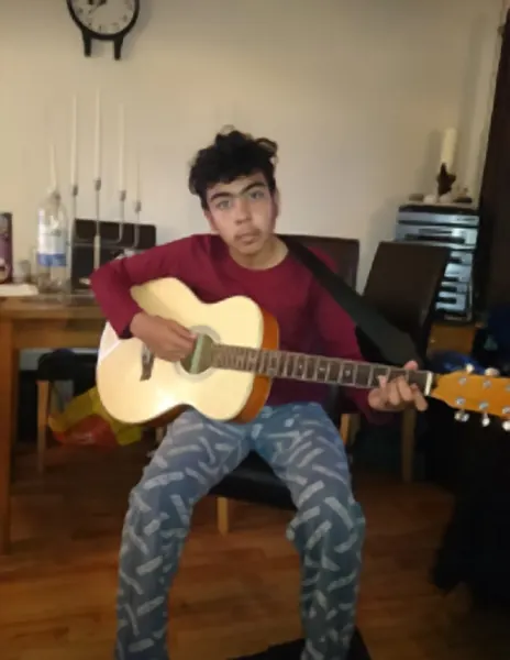 Student profile photo of Leondre Ansah, who plays acoustic guitar and ukulele, Cool Gool Music, Canada Water
