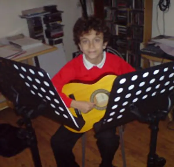 Guitar pupil Marko Mosquera and their classical guitar, taught by Malcolm Callus in London SE16