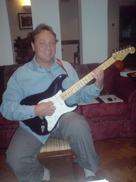 Mike Sledge, an electric and acoustic guitar student of guitar teacher Malcolm Callus in Rotherhithe, London