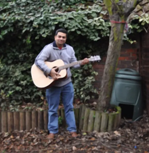 Pavan Kumar, acoustic guitar student at Cool Gool Music, Rotherhithe, London SE16