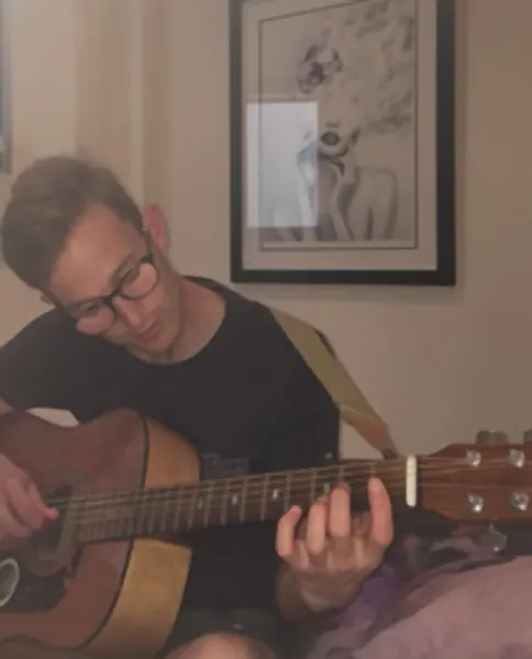 Peter Copper and the acoustic guitar they learn on, Cool Gool Music guitar lessons in Rotherhithe