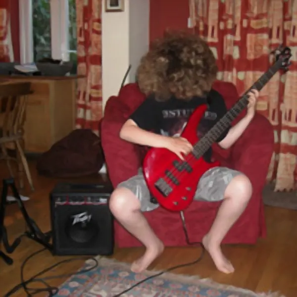Bass guitar student Peter Franklin of Cool Gool Music, Malcolm Callus, London SE16