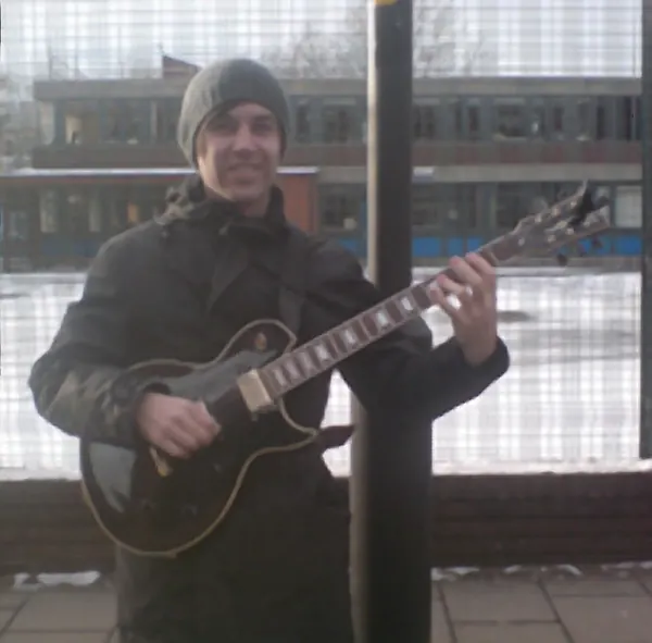 Rowland Phillips plays electric and acoustic guitar with Malcolm Callus at Cool Gool Music, Canada Water SE16