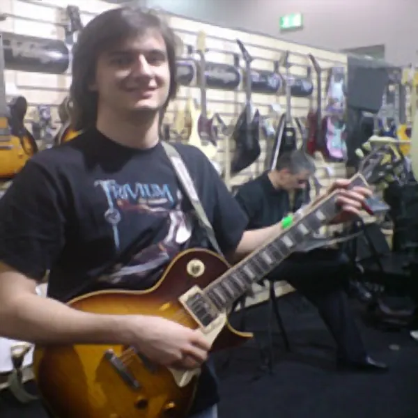 Cool Gool Music student Stefano Garombo pictured with their electric guitar, south east London