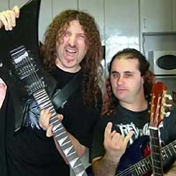 Stephen Mikulic holding their electric guitar — Cool Gool Music guitar lessons, London SE16